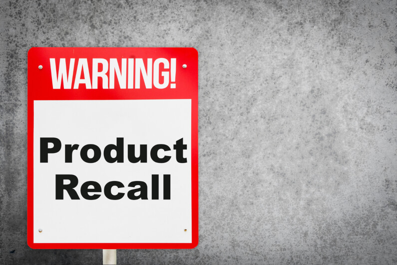 A warning sign that says product recall